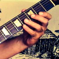 Manjess et sa guitare